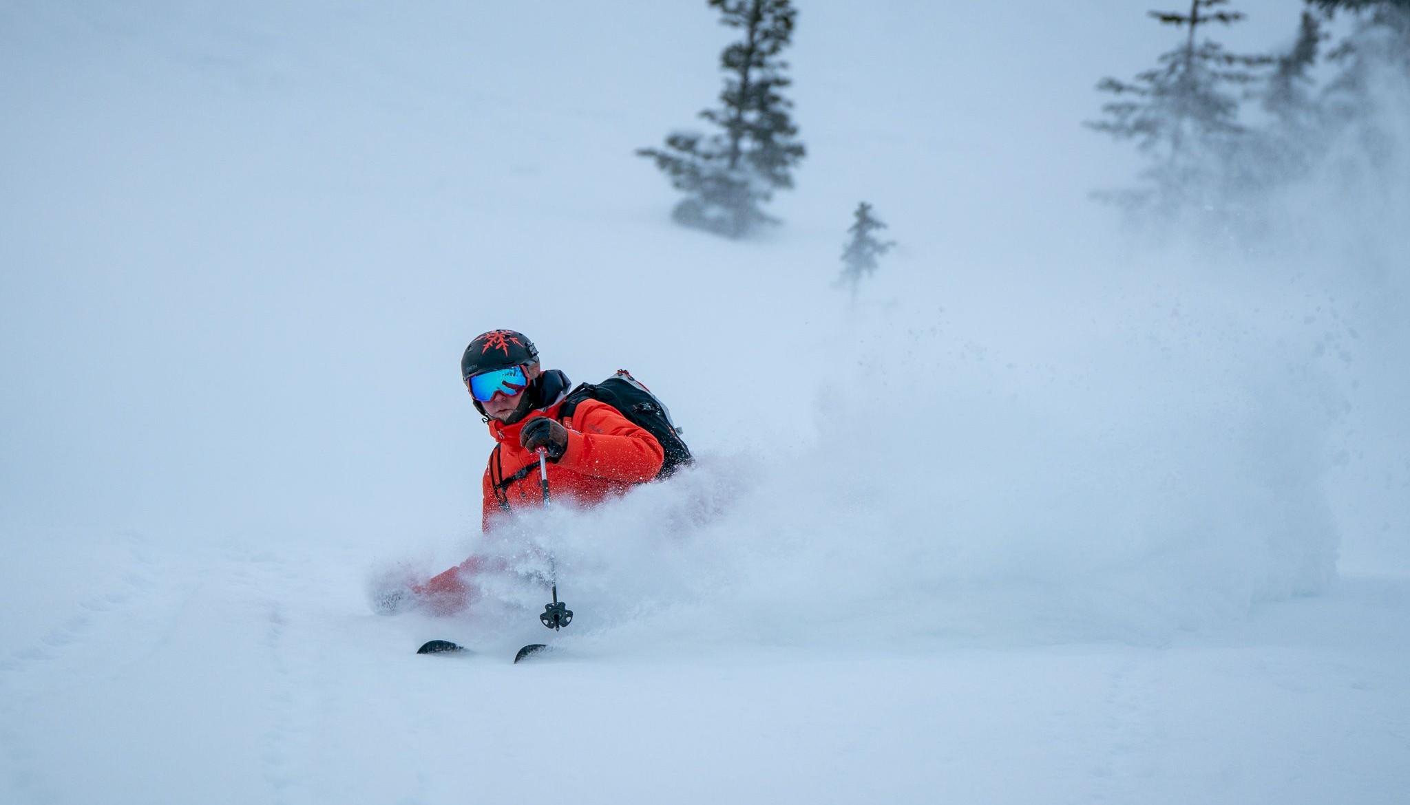 Deep powder turns heli skiing in British Columbia Canada.